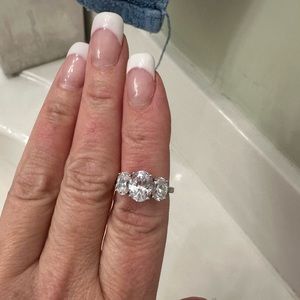 Beautiful three stone Sterling Silver with  CZ oval stone ring .